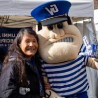 An alum with Louie the Laker.